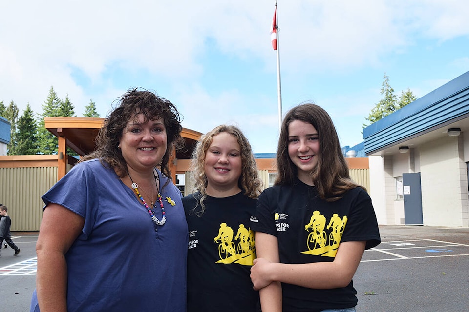 L to R: Christa, Annabel and Natalia Corrigal are avid supporters of Cops for Cancer’s Tour de Rock. Ronan O’Doherty/ Campbell River Mirror