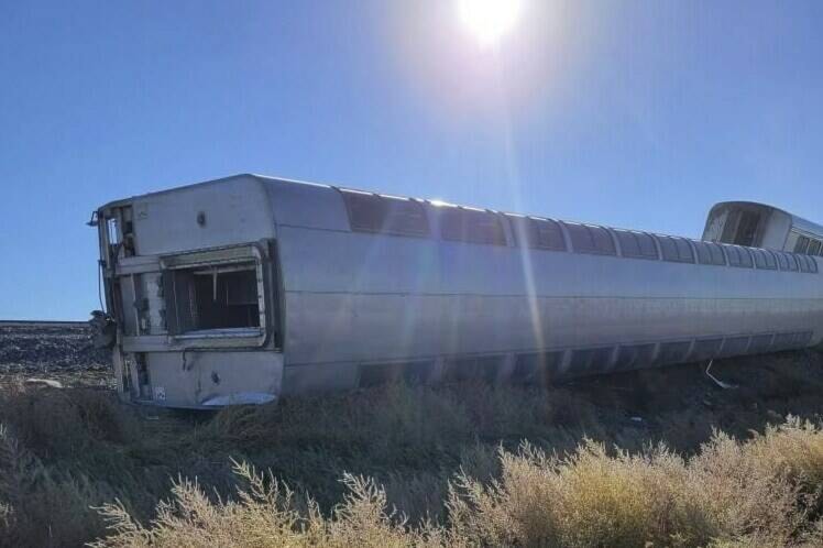 This photo provided by Kimberly Fossen shows an Amtrak train that derailed on Saturday, Sept. 25, 2021, in north-central Montana. Multiple people were injured when the train that runs between Seattle and Chicago derailed Saturday, the train agency said. (Kimberly Fossen via AP)