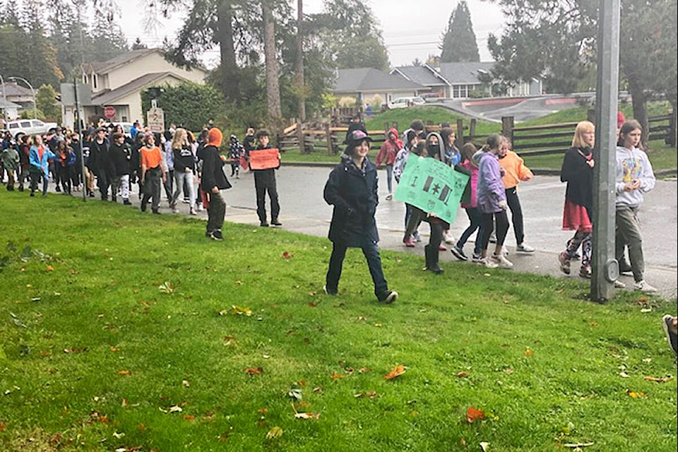 Southgate students held a walk for Truth and Reconciliation along Alder Street Wednesday, Sept. 29. National Day for Truth and Reconciliation is Thursday, Sept. 30 but schools in SD72 will be closed in recognition of the day so students marked it today. Photo by Jacquie Duns/Campbell River Mirror