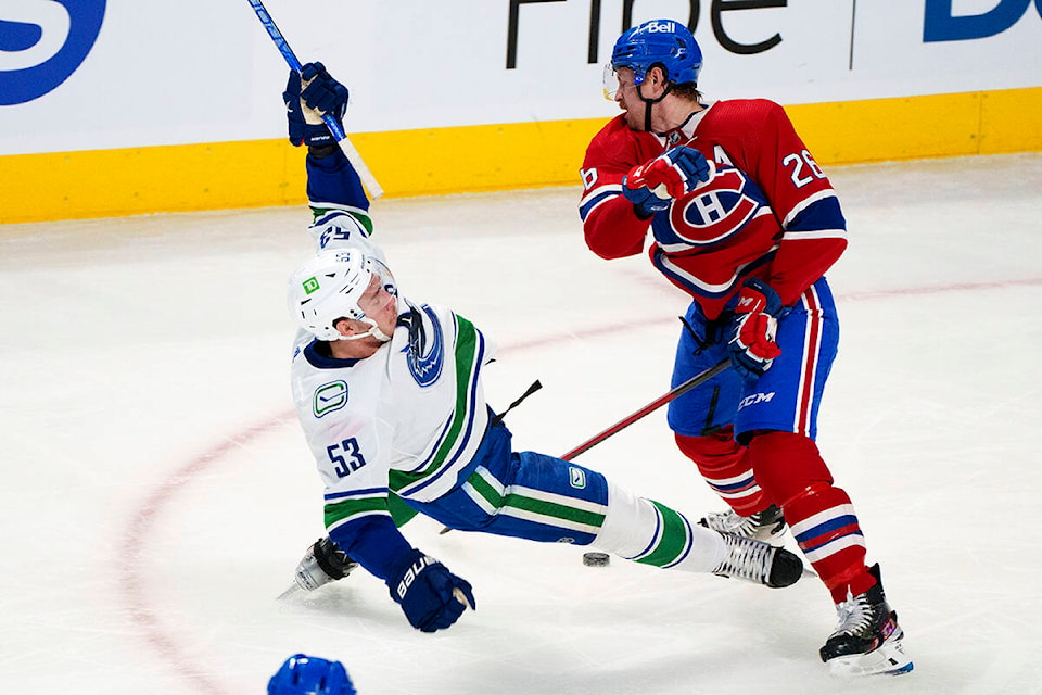 27348647_web1_211129-CPW-Canucks-Canadiens-habs_1