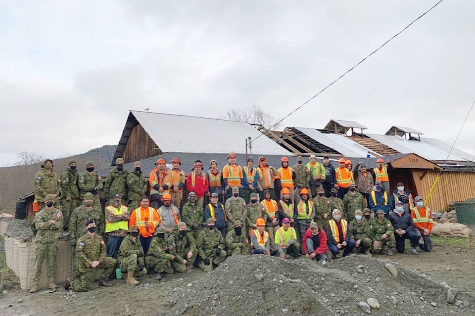27396543_web1_211202-CCI-Cowichan-Tribes-flood-recovery-Armed-Forces_1