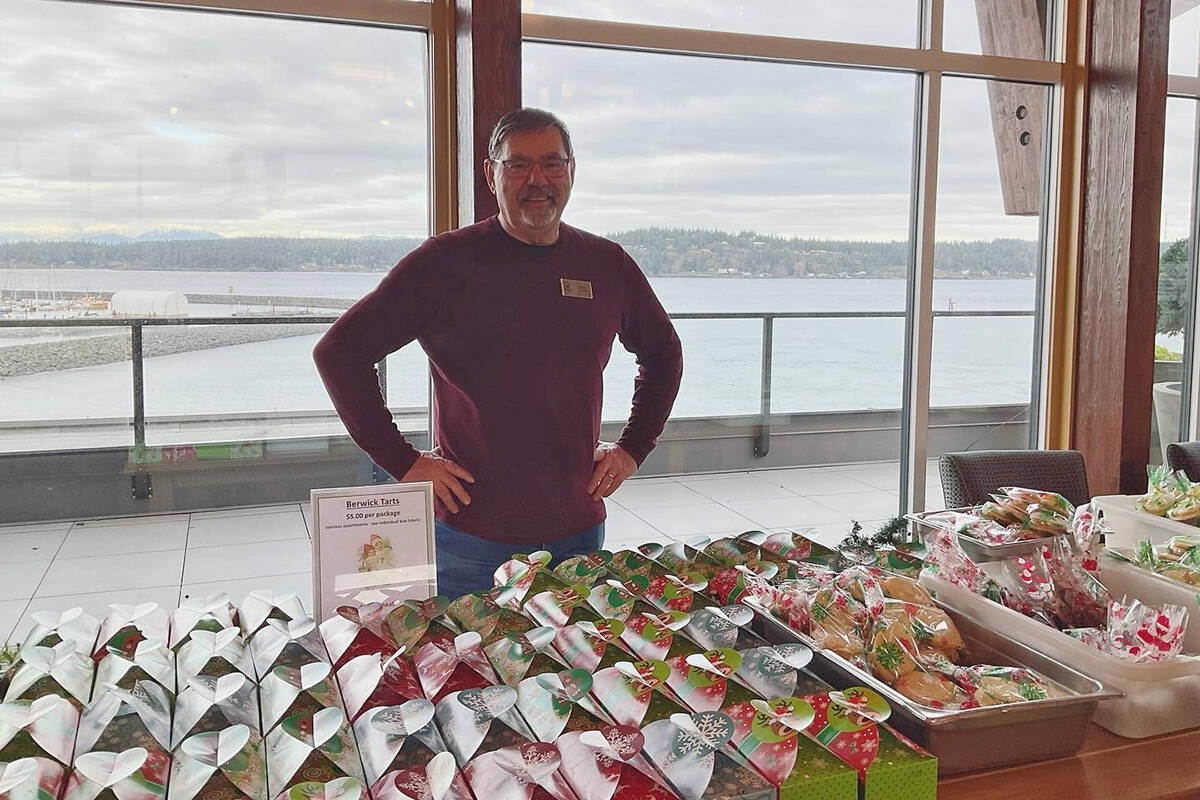 Mario looking after the amazing spread of baking at the Berwick by the Sea craft and bake sale.