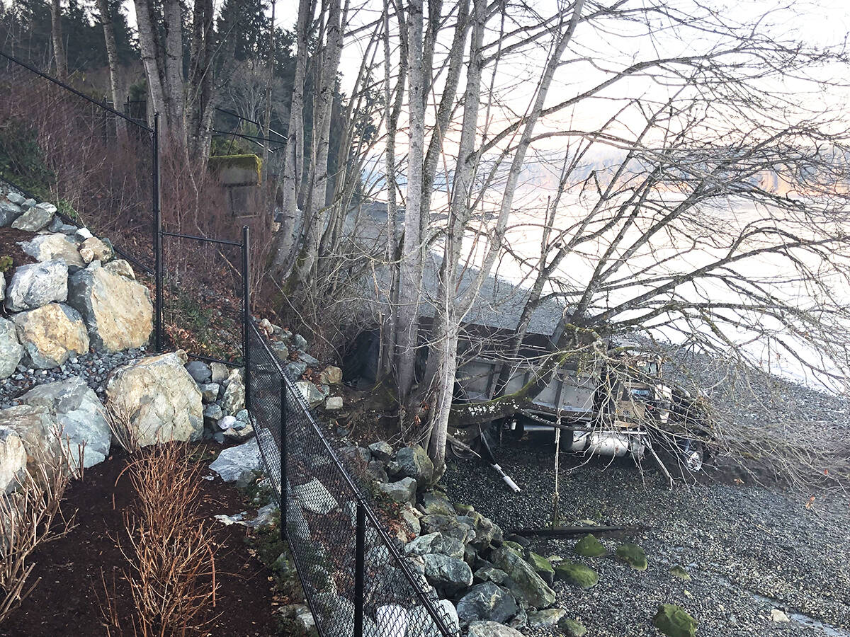 Driver rescued after dump truck plunges into ocean off Mill Bay