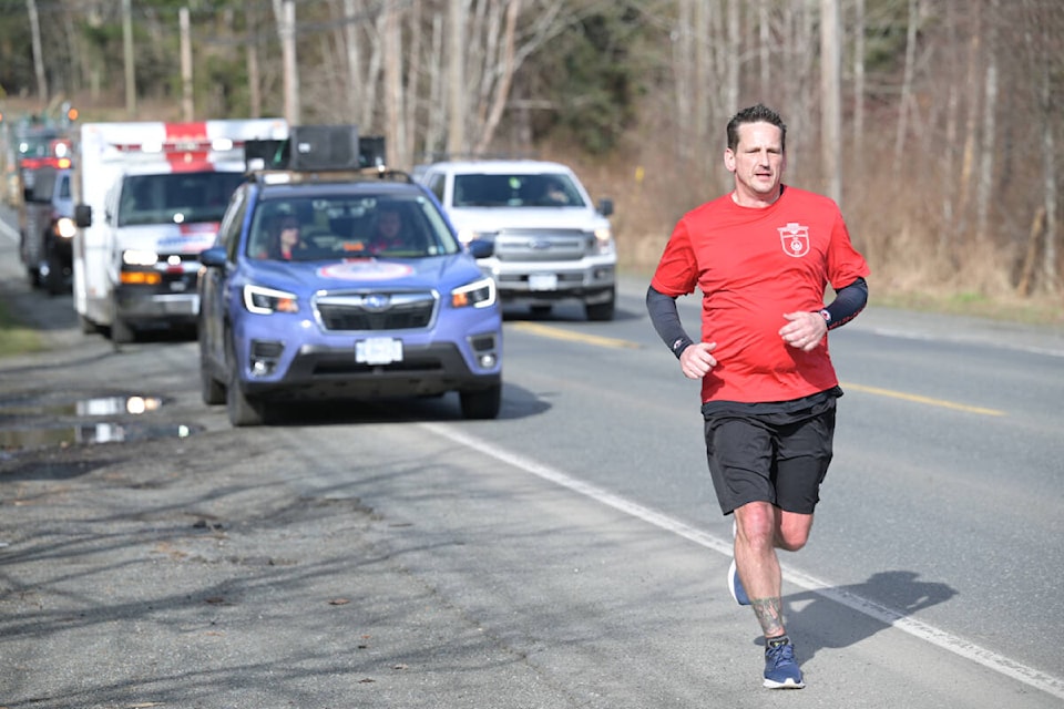 Sgt. Steve Kowan, Victoria Police Department officer and team member of the Wounded Warrior Run BC arrives in Campbell River on March 1, 2022. Photo by Sean Feagan / Campbell River Mirror.