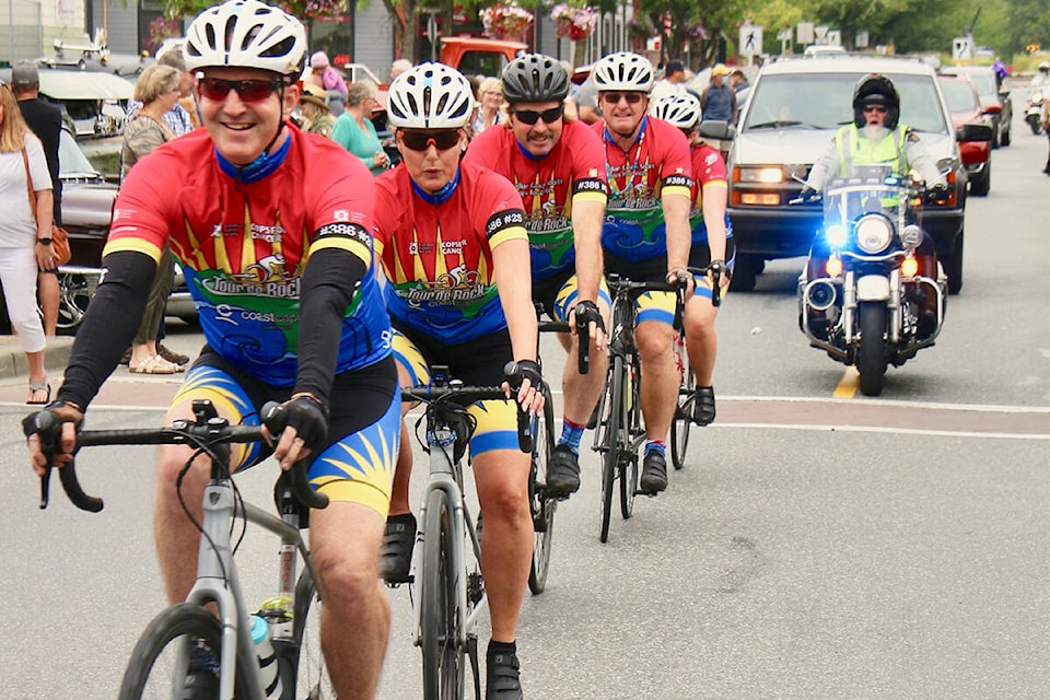 Members of the 2021 Cops for Cancer Tour de Rock ride through Ladysmith on a practice ride. (Photo by Duck Paterson)
