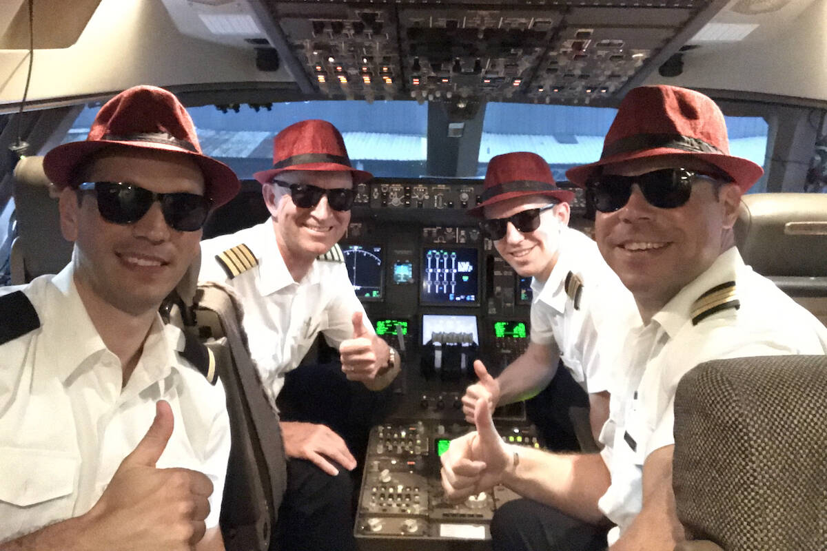 Treverton (second from left) and his colleagues before the last flight of his commercial career. Treverton retired in 2021. Photo: Vince Treverton