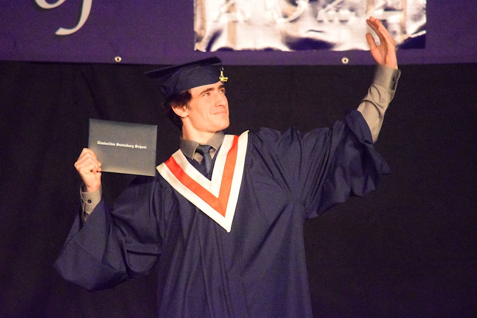 A graduate of Timberline Secondary School receives his diploma. Photo by Marc Kitteringham/Campbell River Mirror