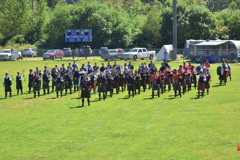 The bands gather again for the Massed Bands Retreat at the end of the day’s events at the Campbell River Highland Gathering on Saturday, Aug. 6, 2022. Photo by Alistair Taylor/Campbell River Mirror