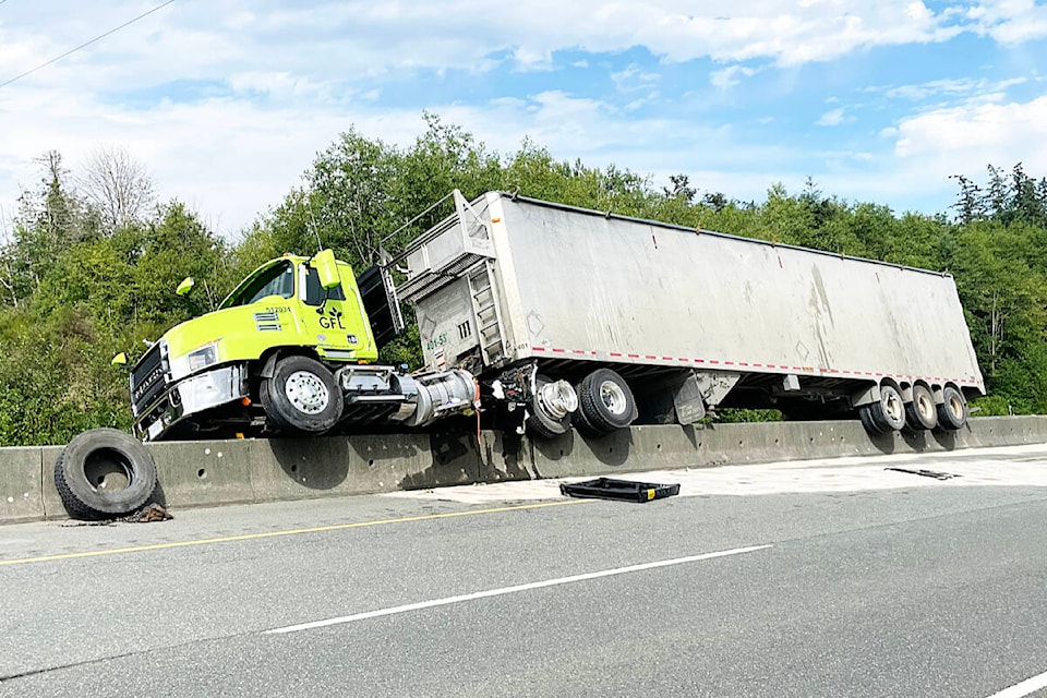30048753_web1_220810-CRM-truck-high-centred-ACCIDENT_1
