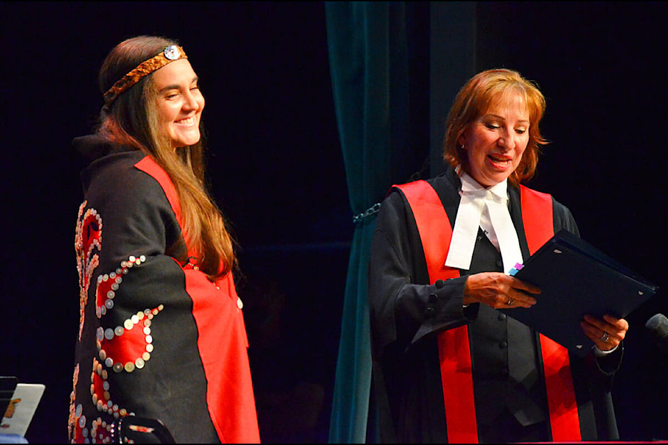 Tanille Johnston (left) is sworn in as Campbell River’s first Indigenous city councillor by Judge Barbara Flewelling at a ceremony held at the Tidemark Theatre Nov. 1, 2022. Photo by Alistair Taylor/Campbell River Mirror