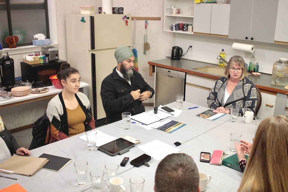 Federal NDP Leader Jagmeet Singh (centre) visited the Campbell River Food Bank to discuss the affordability crisis on Jan. 23. Photo by Marc Kitteringham/Campbell River Mirror