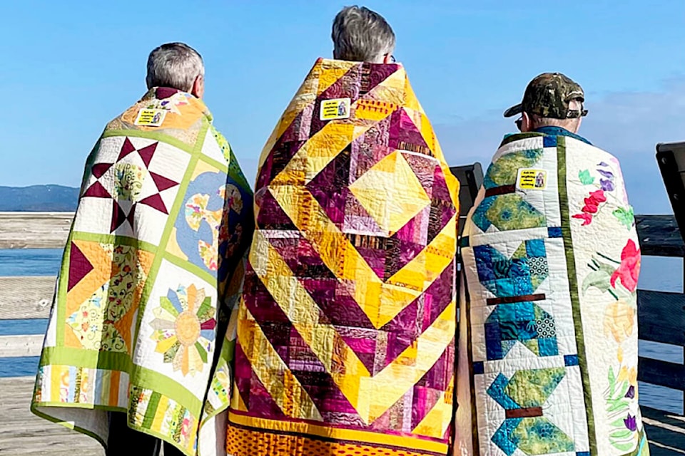 Friendship Quilters Guild walks the streets for International Quilt Day