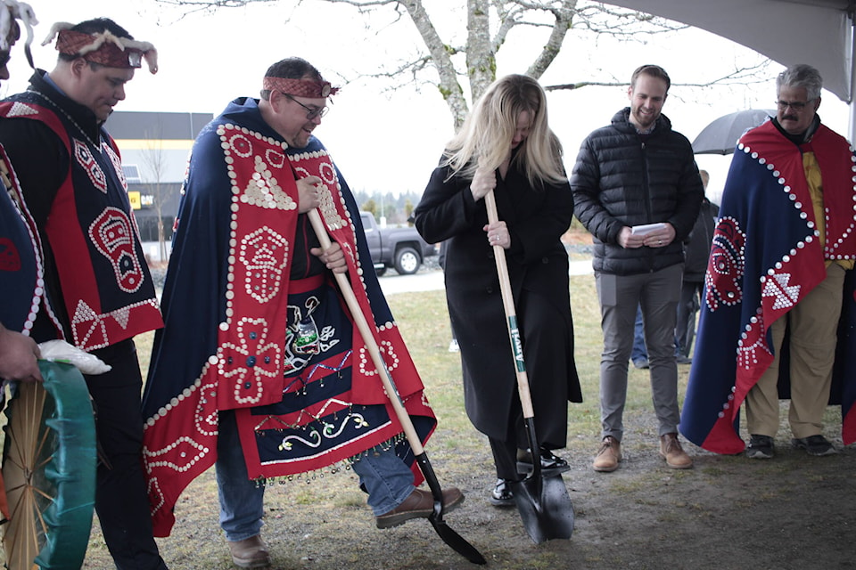 We Wai Kai Chief Ronnie Chickite and Starbucks Canada Vice President Shannon Leisz break ground on a new store that will be built at the Quinsam Reserve. Photo by Marc Kitteringham/Campbell River Mirror