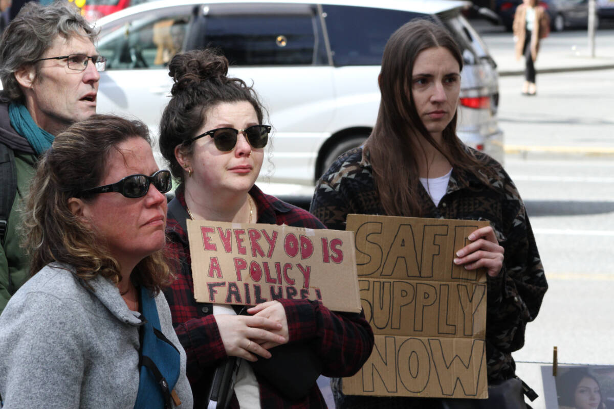 Safe supply advocates hold a rally outside the B.C. Ministry of Health in downtown Victoria April 14. The day marks seven years since the province declared the overdose public health emergency. (Austin Westphal/News Staff)