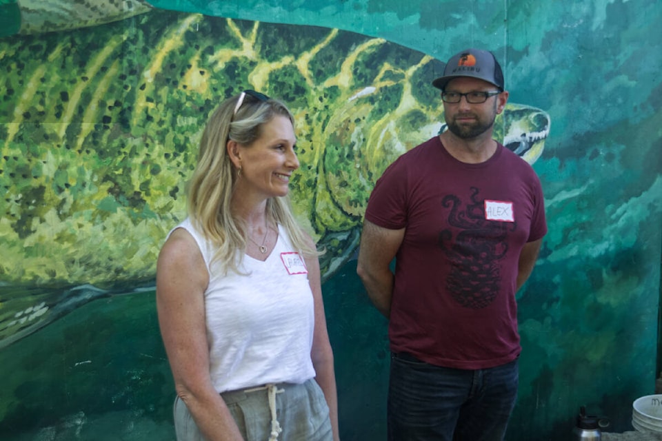 Campbellton Neighbourhood Association chair Laurel Cronk, left and artist Alex Witcombe at the River Nook Park opening on June 6. Photo by Edward Hitchins/Campbell River Mirror