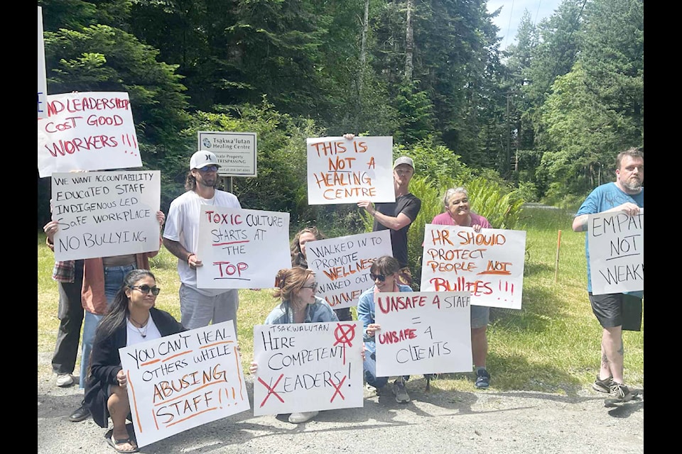 A group of protesters outside of the  Tsa̲kwa̲’luta̲n Healing Centre on June 11.