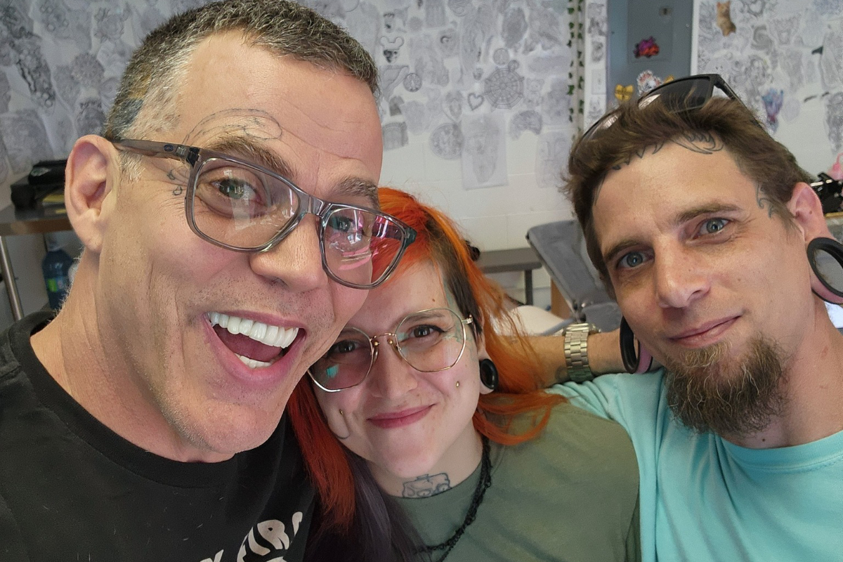 Jackass comedian Steve-O pauses in Island tattoo shop to ink fans