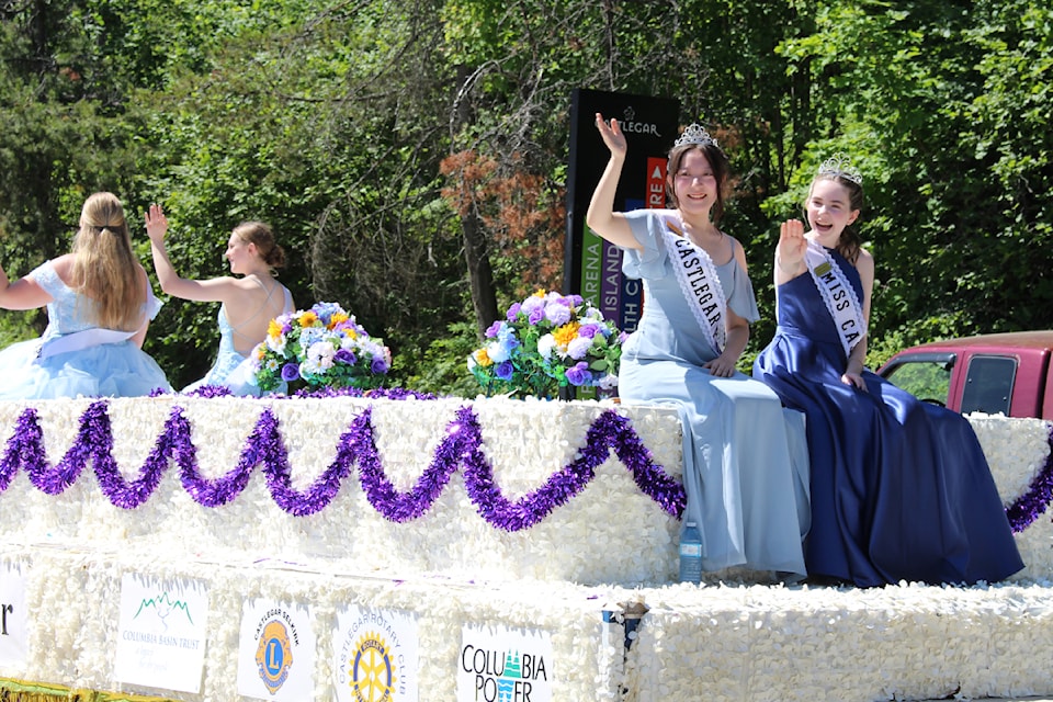 The new Miss Castlegar and Castlegar Princess wave to the Sunfest crowd.