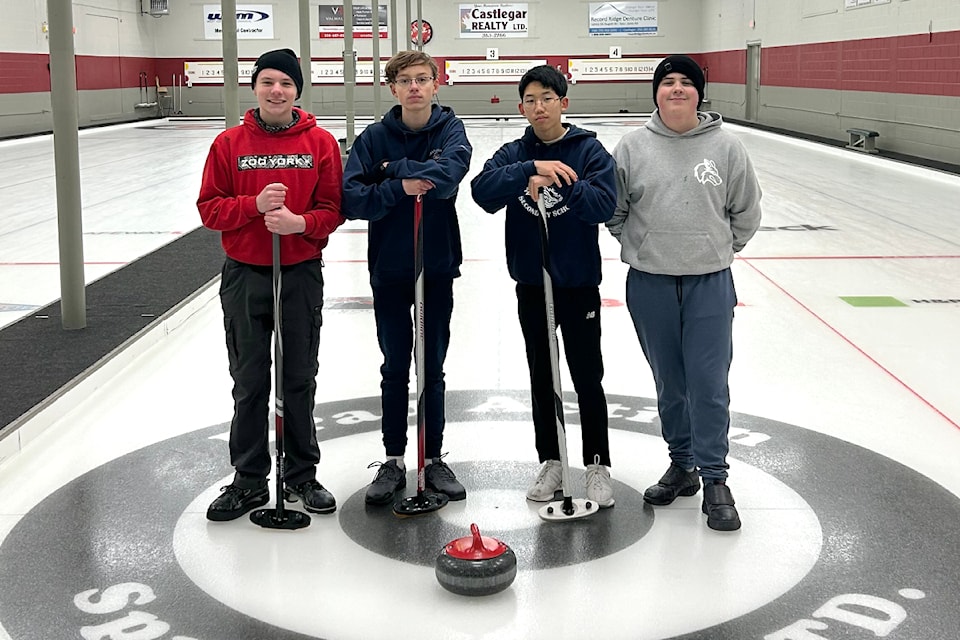 The Stanley Humphries Secondary School curling team: Mica Snauwaert, Theo Kooznetsoff, Taejun Oh, Grady Rodgers and Greyson Evans.