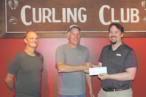 Castlegar Rotary donates to curling club roof replacement project