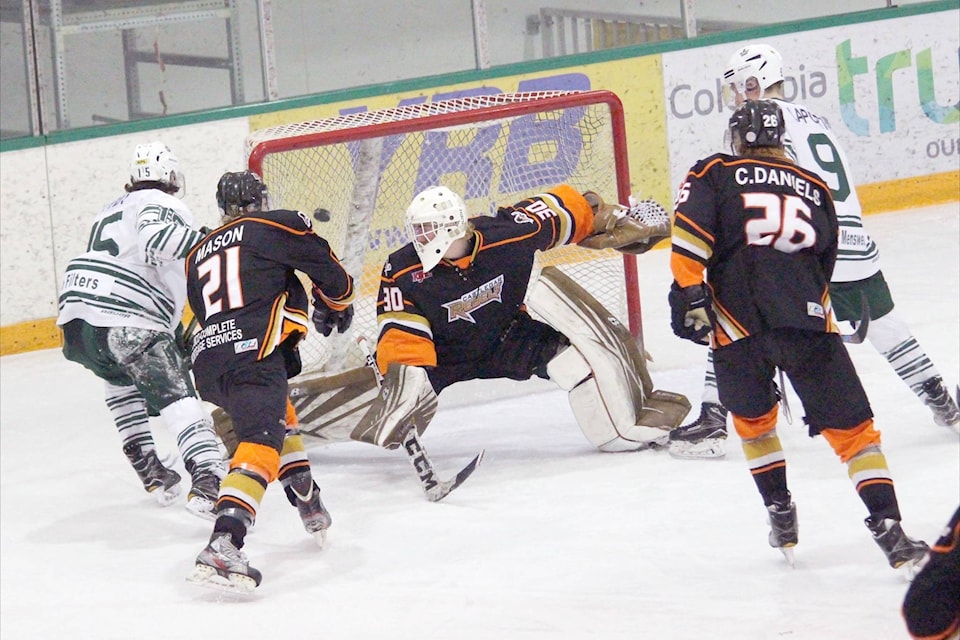 Ryan Piva scores the winning goal in double-overtime for Nelson for the second night in a row seconds after Curt Doyle made the save of the year. (John K. White/Castlegar News)