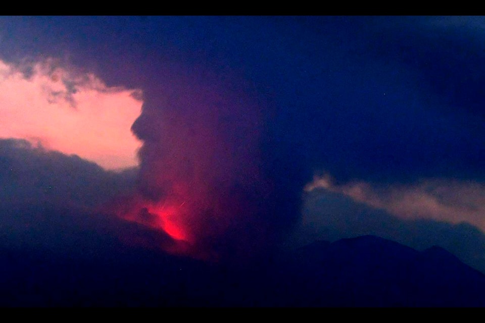 This long exposure image shows the eruption of volcano Sakurajima Sunday night, July 24, 2022, in the view from Tarumizu city, Japan’s southern prefecture of Kagoshima. Japan’s Meteorological Agency said a volcano on Japan’s southern main island of Kyushu erupted Sunday night, spewing ash and volcanic rocks, but there were no immediate reports of damage or injuries in nearby towns. (Kyodo News via AP)