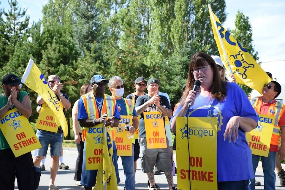 30092450_web1_220815-NDR-M-BCGEU-strike-Delta-44-BCGEU-president-Stephanie-Smith-addresses-members-on-strike-at-BCLDB-Delta-distrubution-centre