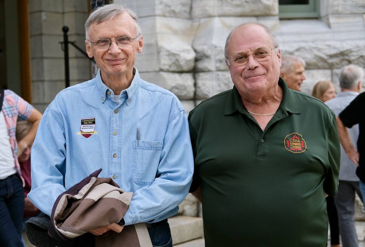 Richard McQuade (left) of Hamilton and William Sharpe of Toronto were delegates at the railway conference over the weekend in Nelson. They are shown outside Touchstones Museum at the opening of the exhibit Back on Track. Photo: Bill Metcalfe