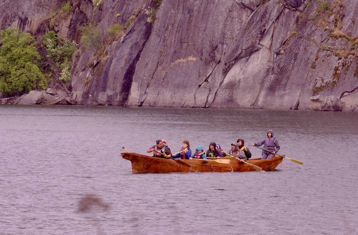 The Sinixt canoe returning from the pictographs. Photo: Bill Metcalfe