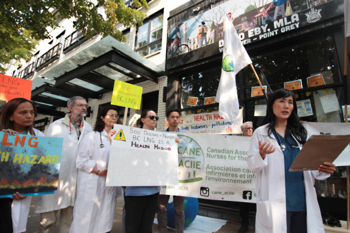Dr. Melissa Lem, a Vancouver physician and president of the Canadian Association of Physicians for the Environment, speaks outside Premier David Ebys Vancouver constituency office Thursday (Aug. 24). The association was calling on the province to put a moratorium on future LNG projects, citing the risks associated with climate change. (Lauren Collins)