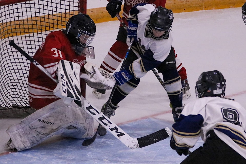 23409185_web1_201126-CAS-HockeyPhotos-hockey_2