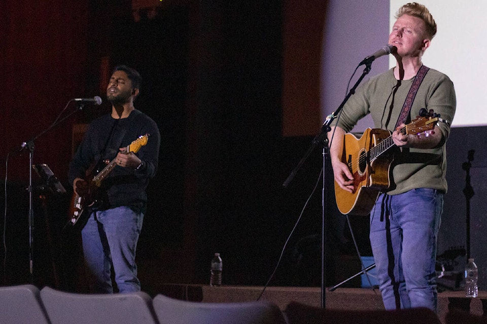 Martin Kerr (right) and Josh Sahunta (left) perform a song they cowrote during Kerr’s performance at the Jewel theatre on Feb. 13, 2022 (Kevin Sabo/Stettler Independent)