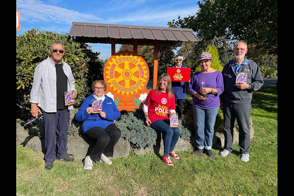 Members of Chemainus Rotary gather to plant purple crocus bulbs for World Polio Day Oct. 24. From left: Art Carlyle, Judi Jackson, Terry Jacques, Shannon Bellamy, Daphne Carlyle, and John Jackson.