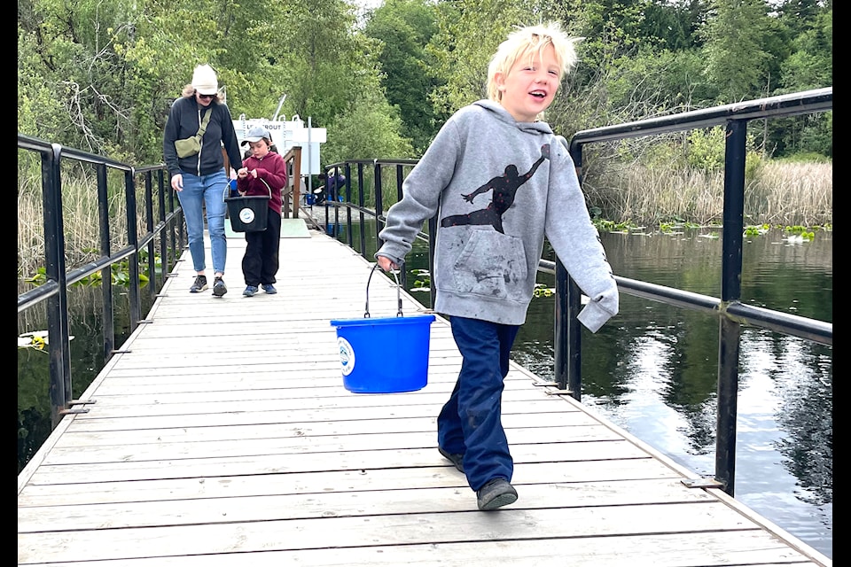 A group of Grade 1 and 2 French immersion students from Madame Camille's class at North Oyster Elementary School joined staff from the Freshwater Fisheries Society of B.C. in May to release 500 rainbow trout into Chemainus Lake.