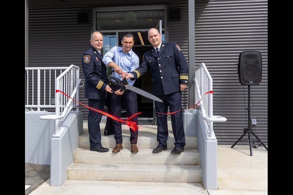 Ribbon cutting at the new Crofton Fire Hall. From left, Deputy Chief Chris Jancowski, Mayor Rob Douglas, and Crofton Fire Hall station chief Matt Ludvigson.