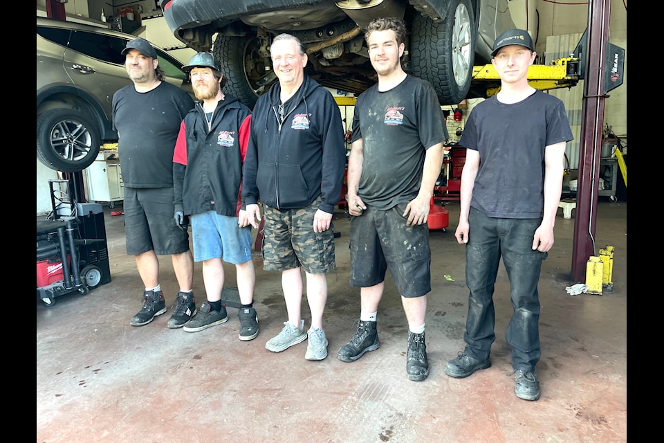 The team at McBride's Service Station (from left) Rick Hornett,
Derek Hornett, Terry Dockrill, Chris Robinson and Keenan Reeves.