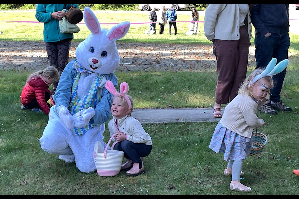 Say carrots! Posing for photos with the Easter Bunny at the annual Chemainus Easter Egg Hunt.