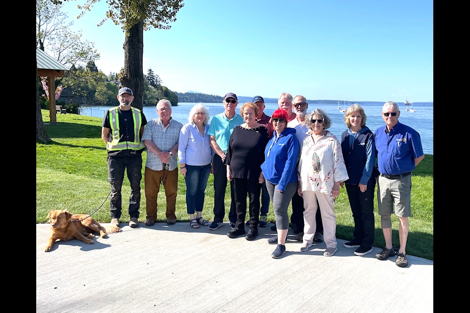 The group that made it happen. (From left, back row) Mark Staples of Rein Timberworks with Checo, Stewart Cox, Ro-Lynda Toombs, Tom Andrews, Gerald Fitzgerald, Roy Toombs,  John Jackson, Sue Dragamon, Derek Hardacker. (Front row) Judi Jackson, Doc Morrell, Susan Martin.