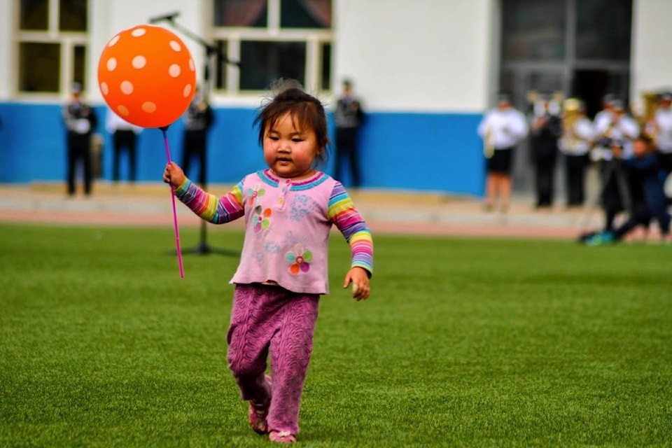 8492784_web1_170913-BPD-M-people-girl-play-kid-balloon-cute-green-soccer-child-playing-stadium-fun-happy-toddler-mongolia-happy-kid-696421