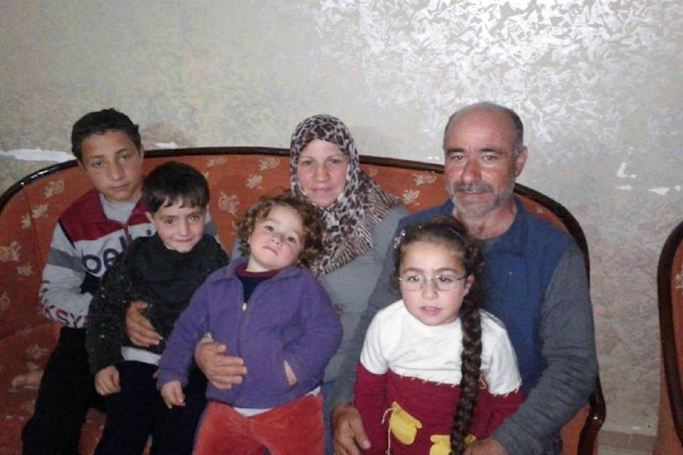 10907661_web1_refugee-family