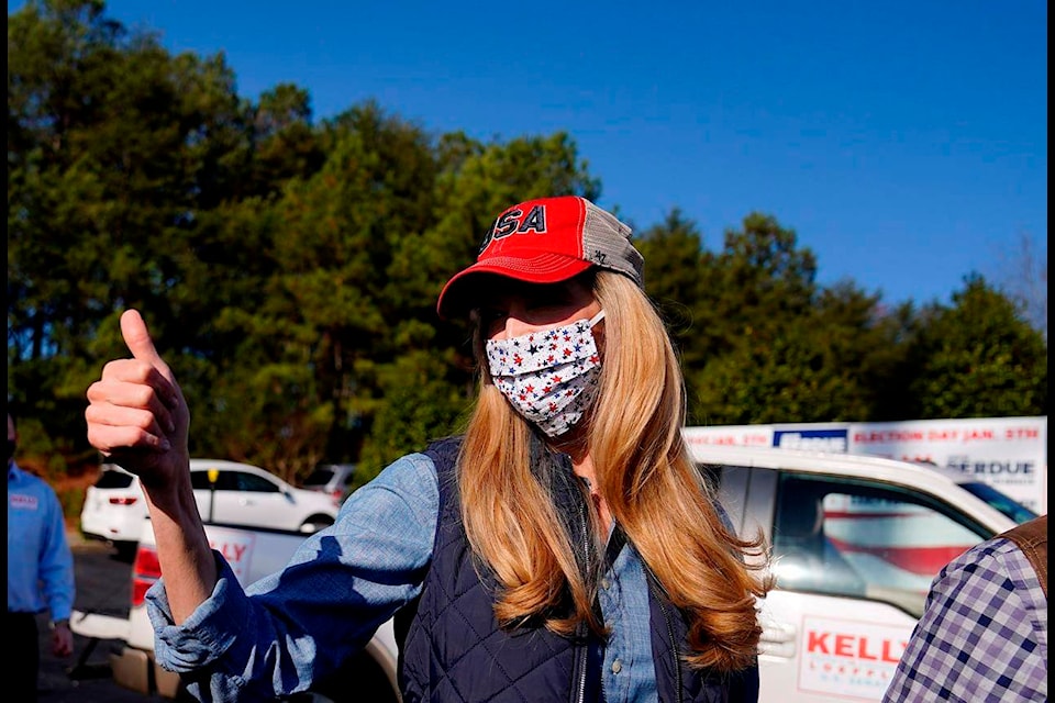 Sen. Kelly Loeffler, R-Ga., greets a crowd after she spoke at a campaign rally on Saturday, Jan. 2, 2021, in Cumming, Ga. (AP Photo/Brynn Anderson)