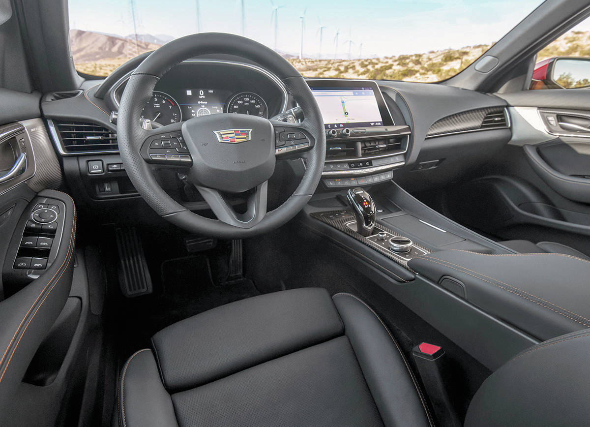 It might look like the normal CT5 interior, but theres a Race mode and two levels of Sport mode, paddle shifters and a little V button on the steering wheel the makes the car sound louder. PHOTO: CADILLAC