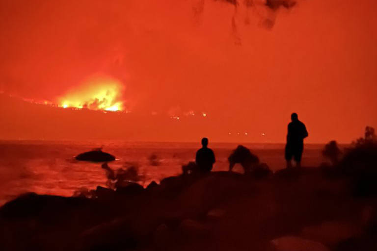PHOTOS: White Rock Lake wildfire lights up night skies in the Okanagan