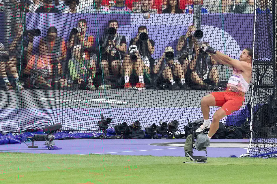 Rowan Hamilton launches a throw in the Hammer Throw Final at Stade de France during the 2024 Olympic Summer Games in Paris, France from July 26-Aug. 11.