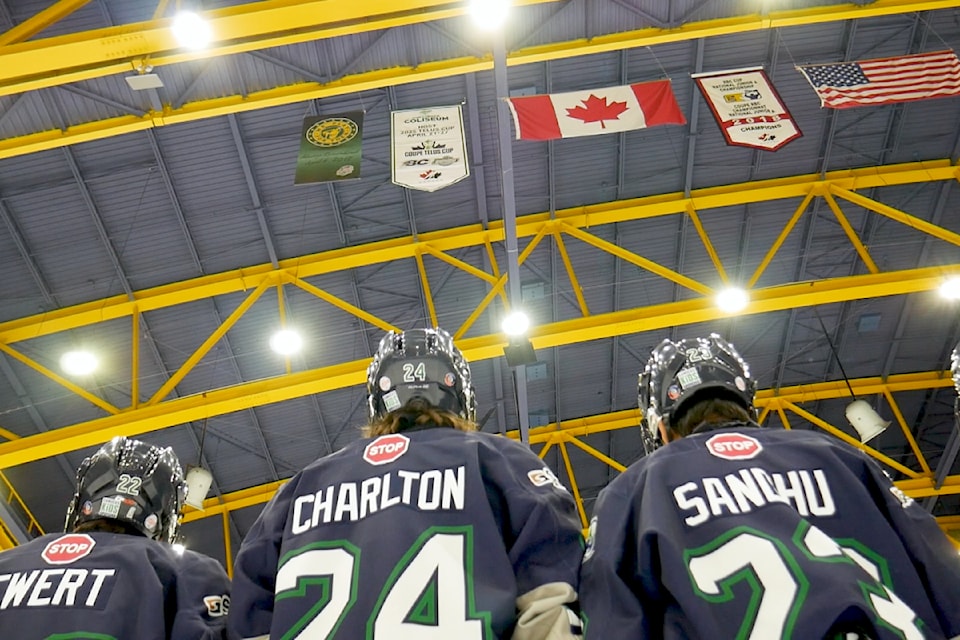 The Fraser Valley Thunderbirds watch as the banner for the 2025 Telus Cup is hoisted at Chilliwack's Coliseum, Dec. 15, 2024. 