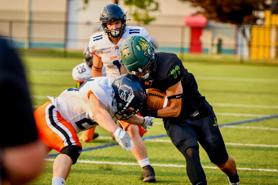 Jawad Harb breaks a tackle during the Valley Huskers season opener against the Kamloops Broncos at Exhibition Stadium on July 27, 2024. 