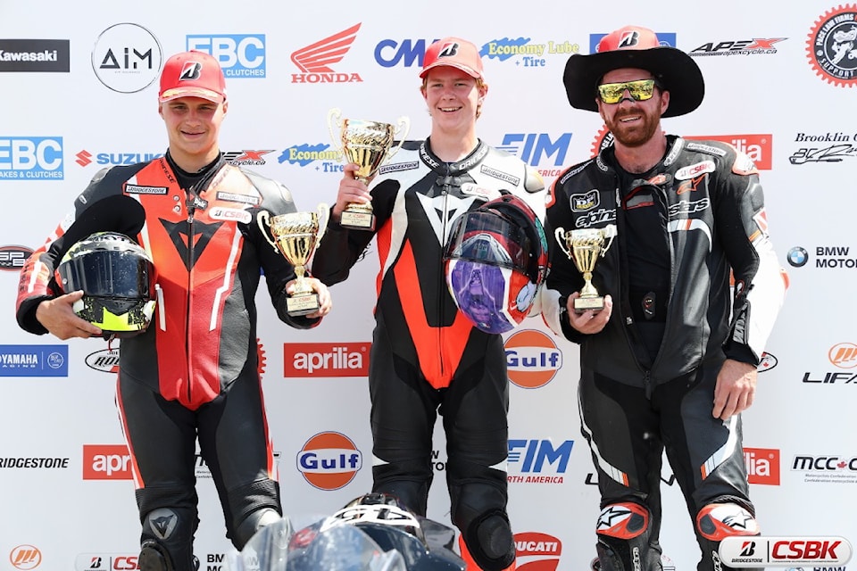 Chilliwack's AJ Van Winkle (centre) with Maverick Cyr (left) and John Laing (right) celebrates his first place finish in the second race in round three of the Bridgestone Canadian Super Bike Championship at R.A.D Torque Raceway in Edmonton, AB, June 21-13, 2024. 
