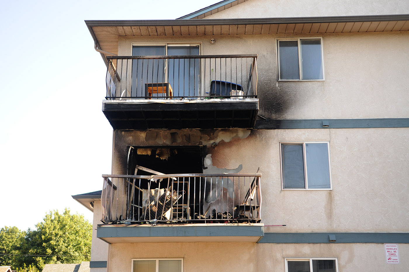 An apartment building on Princess Avenue in Chilliwack is seen on Friday, June 21, 2024, the morning after a fire broke out there. (Jenna Hauck/ Chilliwack Progress)