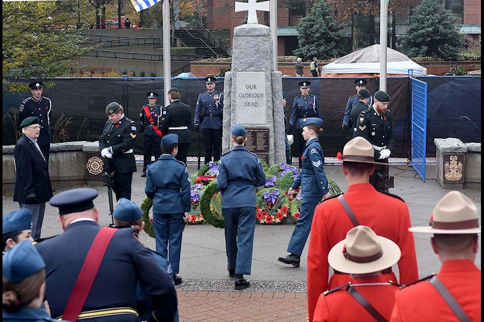 People take part in the Remembrance Day ceremony in Abbotsford on Monday, Nov. 11, 2024.