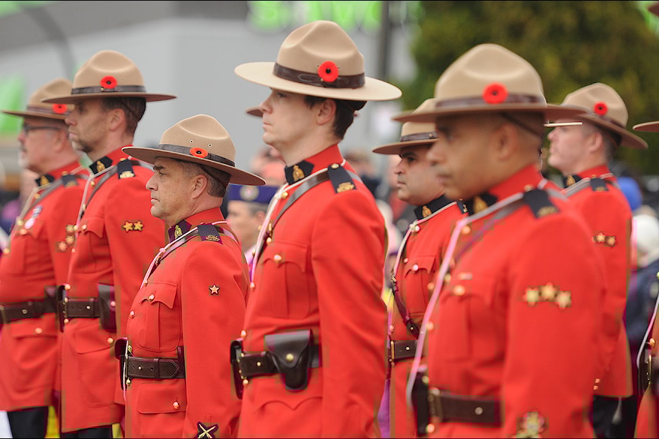RCMP in red serge take part in the Remembrance Day ceremony at Veterans' Memorial Park in Chilliwack on Monday, Nov. 11, 2024.